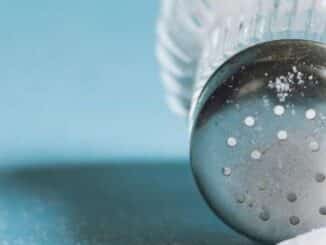 Spilled Salt Shaker with Blue Background