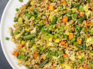 overhead image of Low Sodium Frozen Vegetable Fried Rice on a white plate