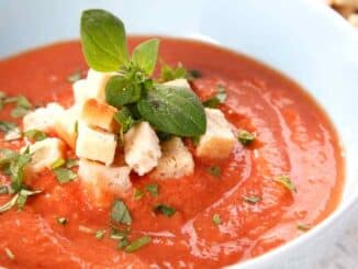 close up of a bowl of tomato soup