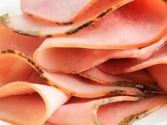 lunch meat on a cutting board