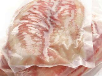 frozen fish filets wrapped in plastic