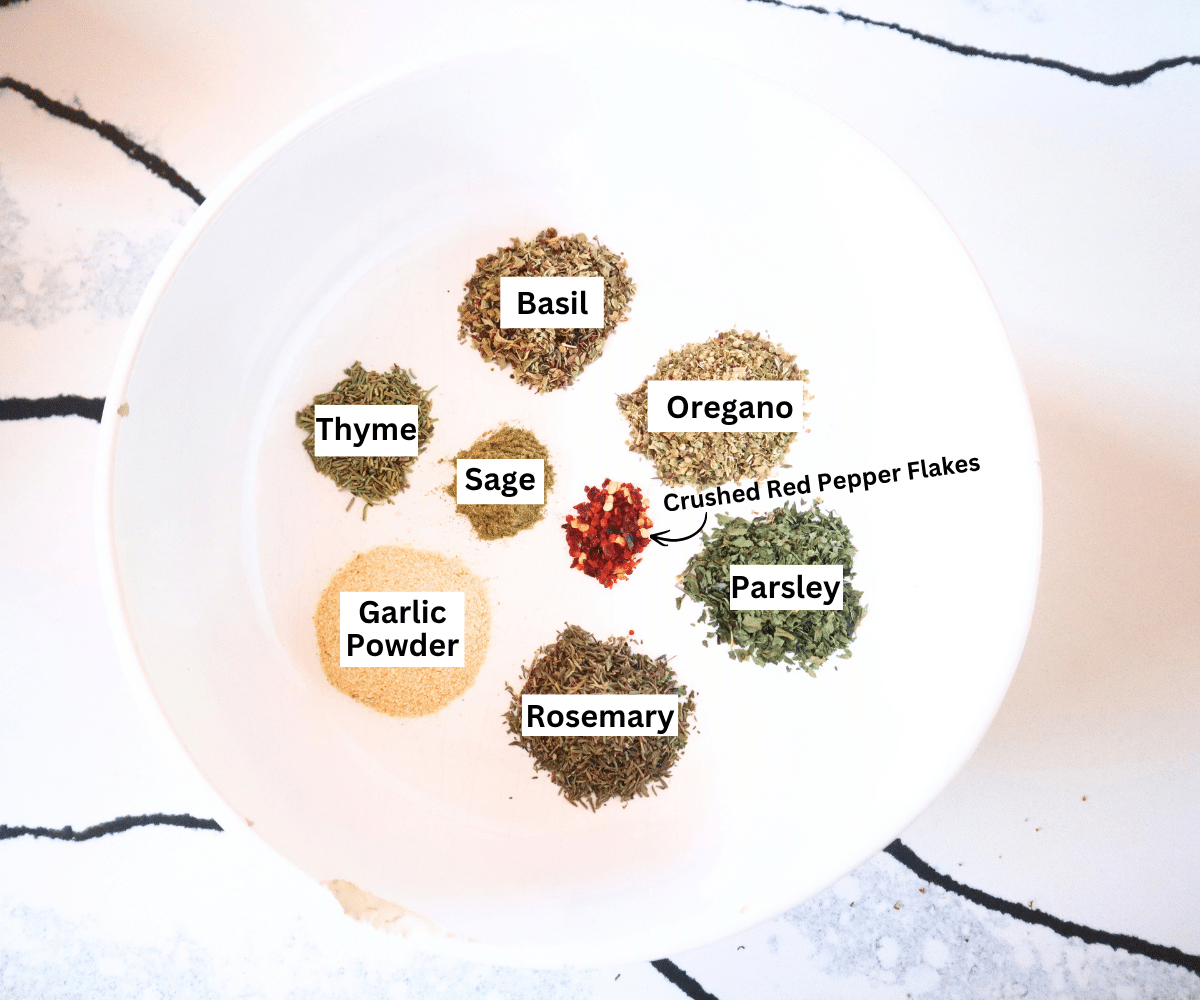 labeled spices in large white bowl